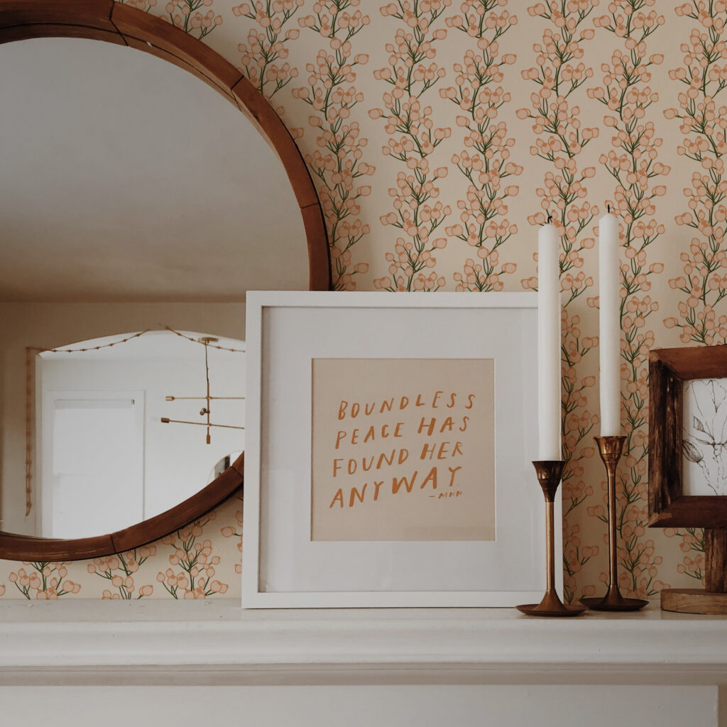 Trailing Berry wallpaper in peach and green by Atelier Danielle