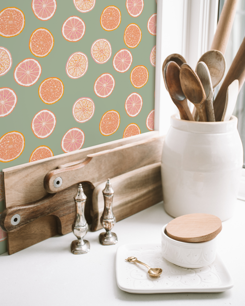 Grapefruit wallpaper in orange and pink by Atelier Danielle